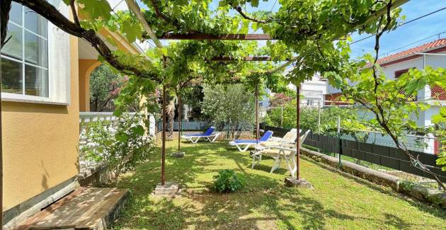 Appartamento Mara A4 – Terrazza e vista giardino
