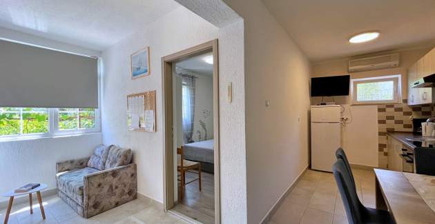 Appartamento Mara A4 – Terrazza e vista giardino