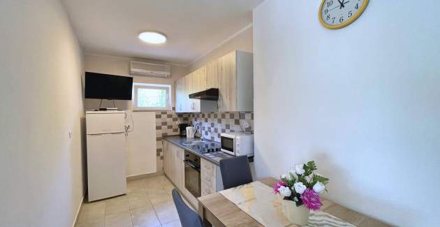 Appartamento Mara A4 – Terrazza e vista giardino