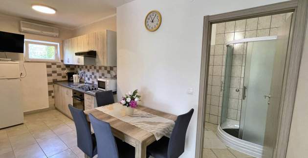 Appartamento Mara A4 – Terrazza e vista giardino