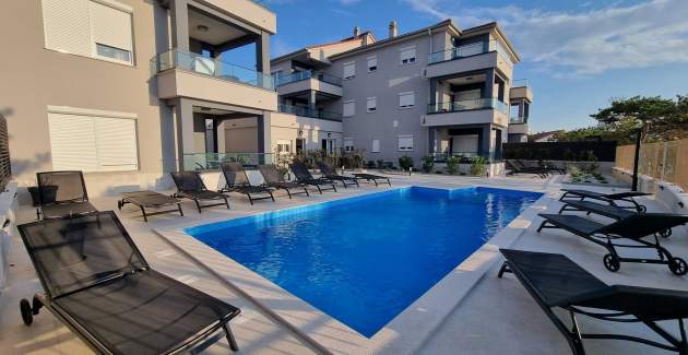 Appartamento Punta Silo A8 – piscina e vista mare