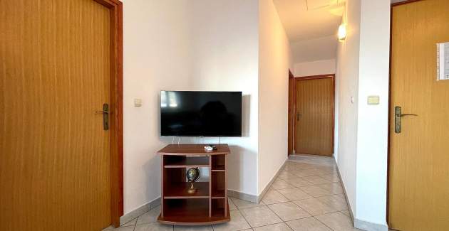 Capic Z6 – Appartamento con balcone e posto auto, a 300 m dalla spiaggia