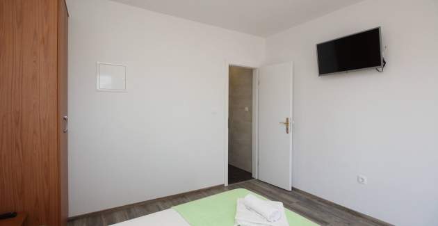 Camera Dekanic n.3 – con mini frigorifero e balcone